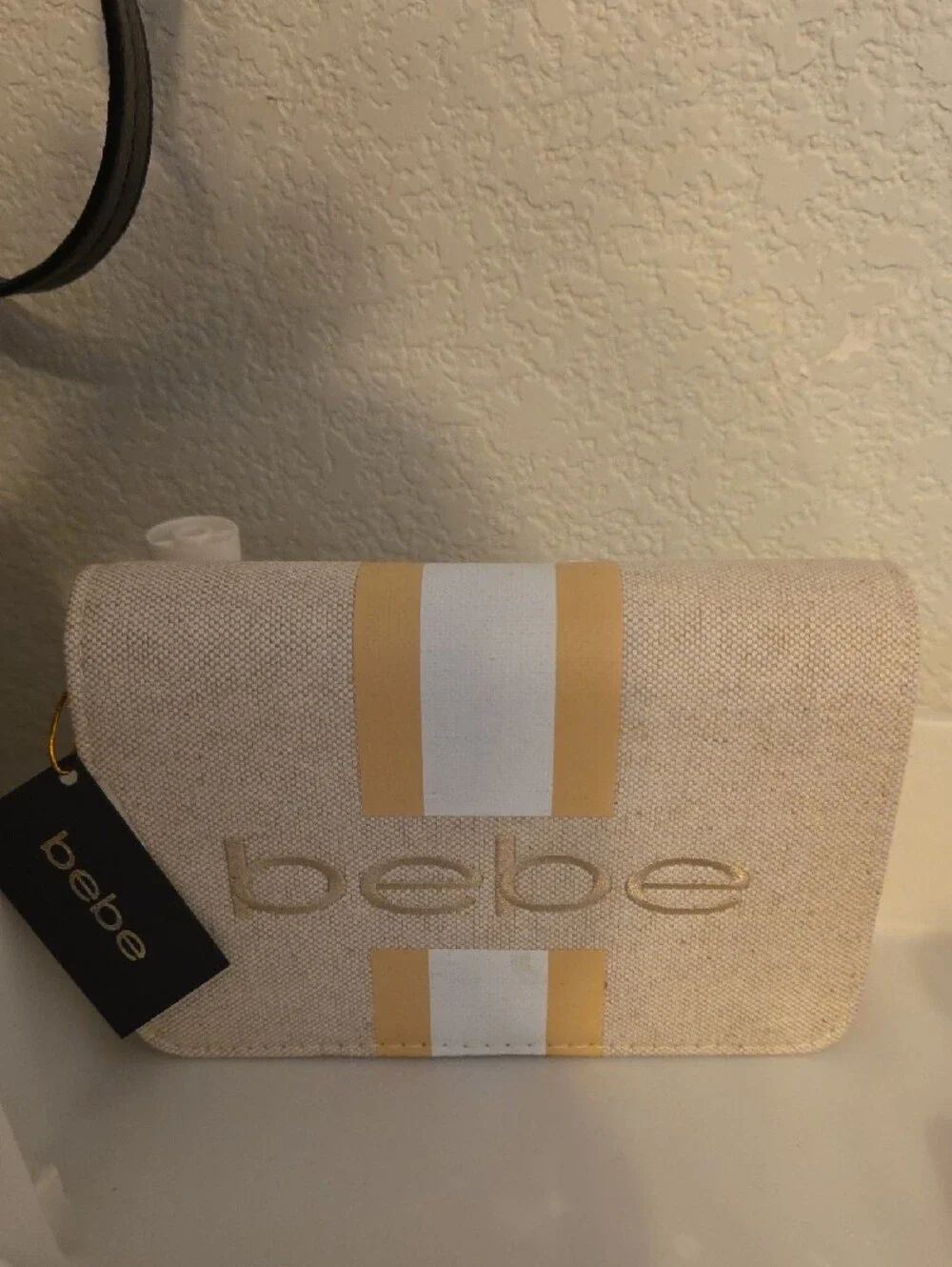 bebe Beige Clutch with Yellow and White Stripes